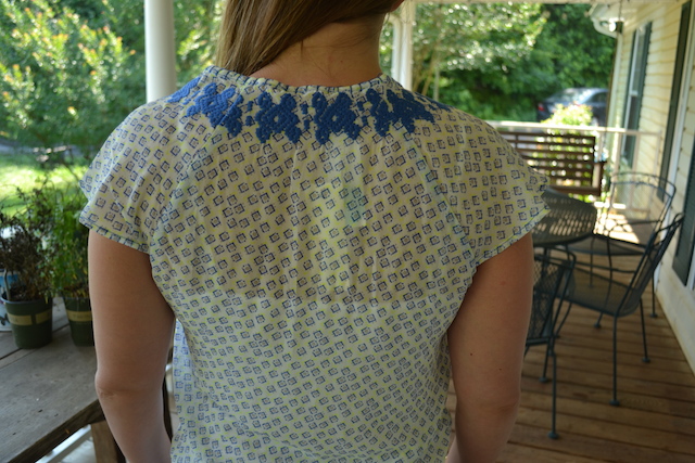 Back of Under Skies Henry Embroidery Detail Tie-Neck Blouse