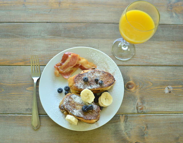 Nutella and Banana Stuffed French Toast with Orange Juice and Bacon