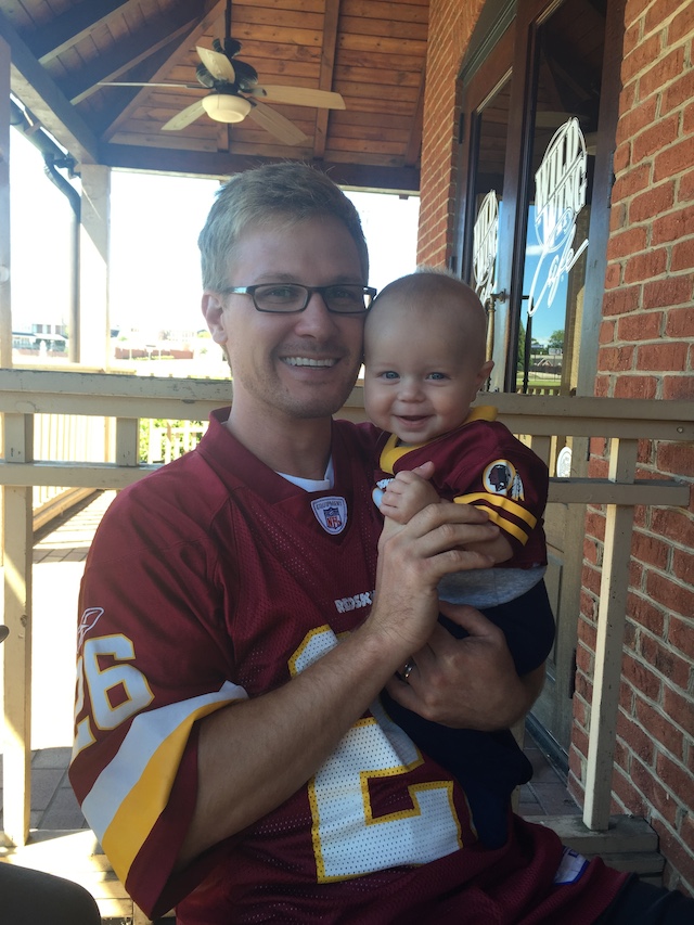Seth and Remy cheering on the Redskins