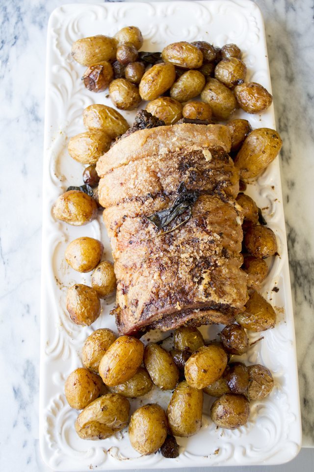 Kumquat Stuffed Porchetta with Crispy Sage Potatoes