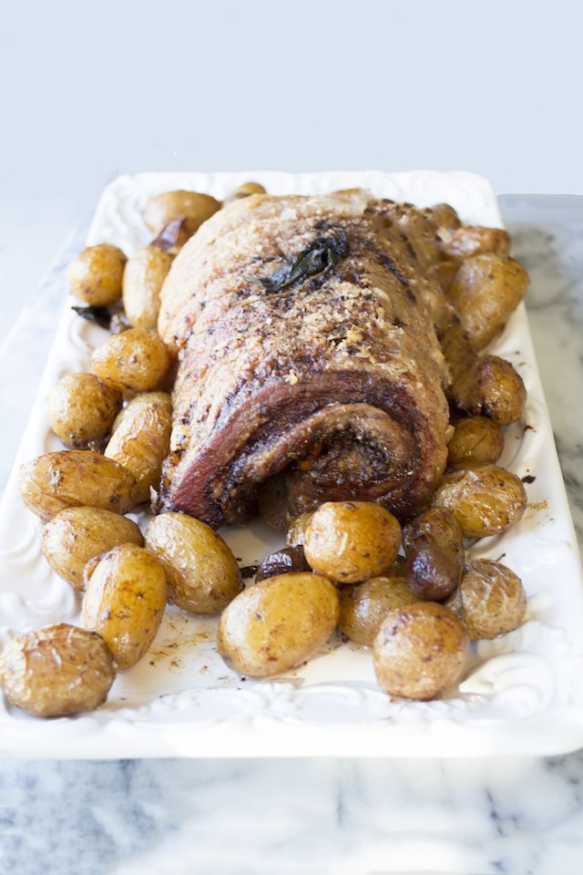 Kumquat Stuffed Porchetta with Crispy Sage Potatoes